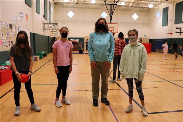 Mrs. Martin poses with a few of her students at East Goshen Elementary School.